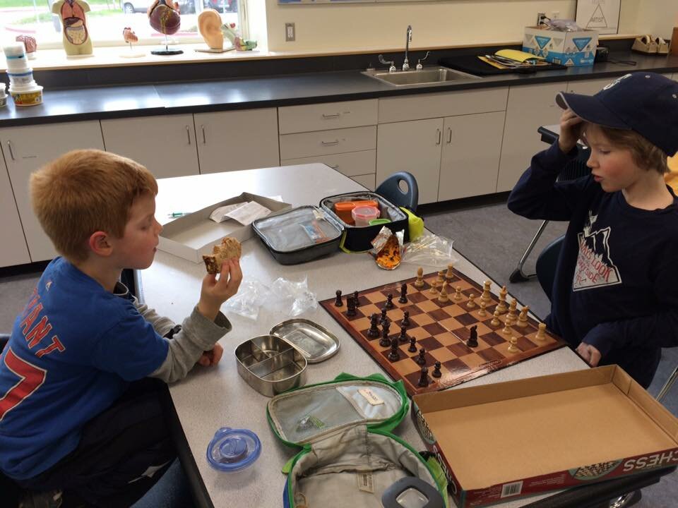 Photo courtesy of FVCS Chess Club is back right after school on Wednesdays. Passage Stinson and Hardy Wade snack and strategize.
