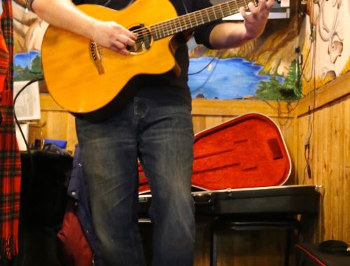 Marc Donadieu / Glacier City Gazette Rick Brooks plays a mix of Mississippi acoustic blues, solo classic rock interpretations, and other diverse musical journeys depending on the audience before him.